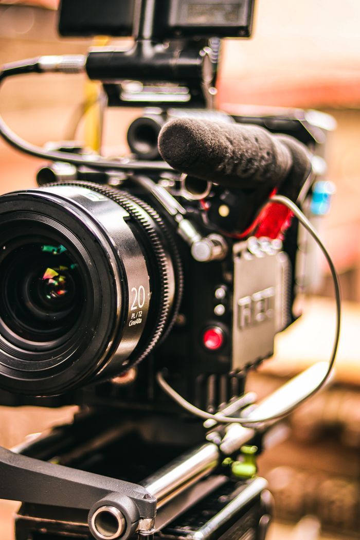 Crafting Captivating Headlines: Your awesome post title goes here Detailed view of a professional video camera setup with attached microphone for videography.